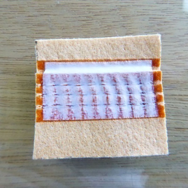 Opsi untuk Pencegahan Kebocoran Kantong Filter di Pembangkit Listrik Tenaga Batubara: Perbandingan Proses Pelapisan Perekat dan Proses Aplikasi Pita PTFE